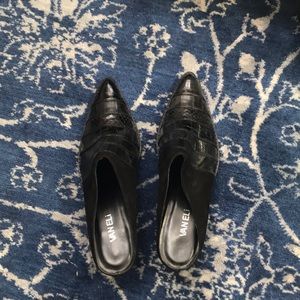 Black leather and suede slip on heels